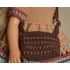 Crochet doll shoulder bag with adjustable strap, handmade accessories.