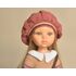 Close-up of Paola Reina doll face with handmade crochet beret.
